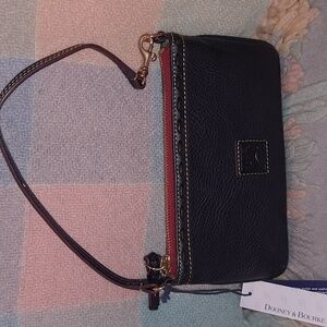 Dooney and Bourke Large slim wristlet in Navy Florentine leather